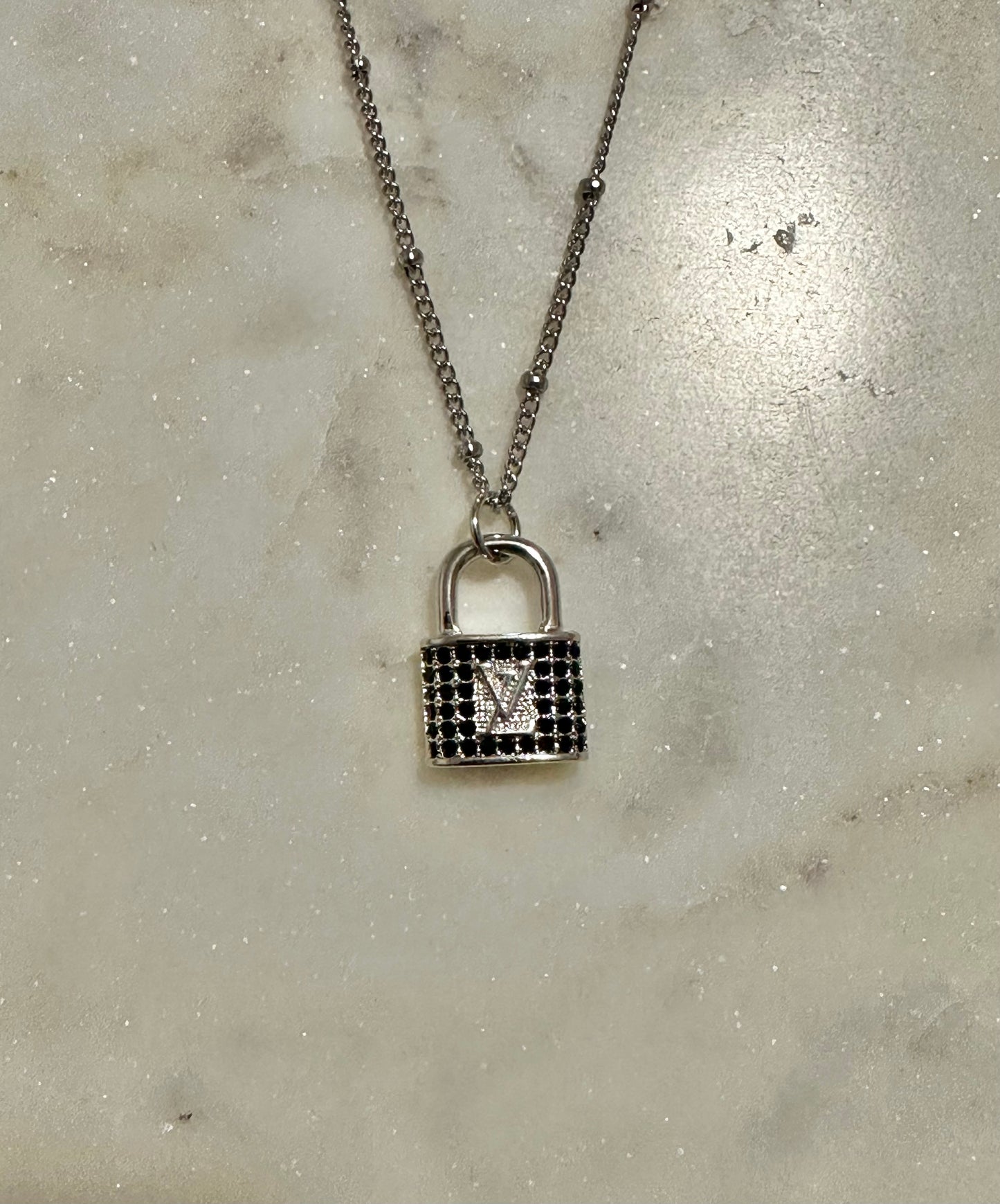 LV black rhinestone lock necklace