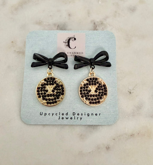 LV black and gold tone earrings