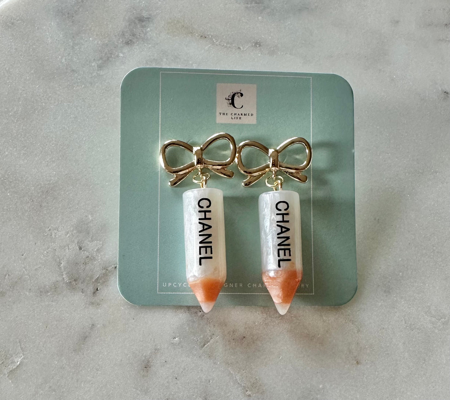 Chanel pencil bow earrings