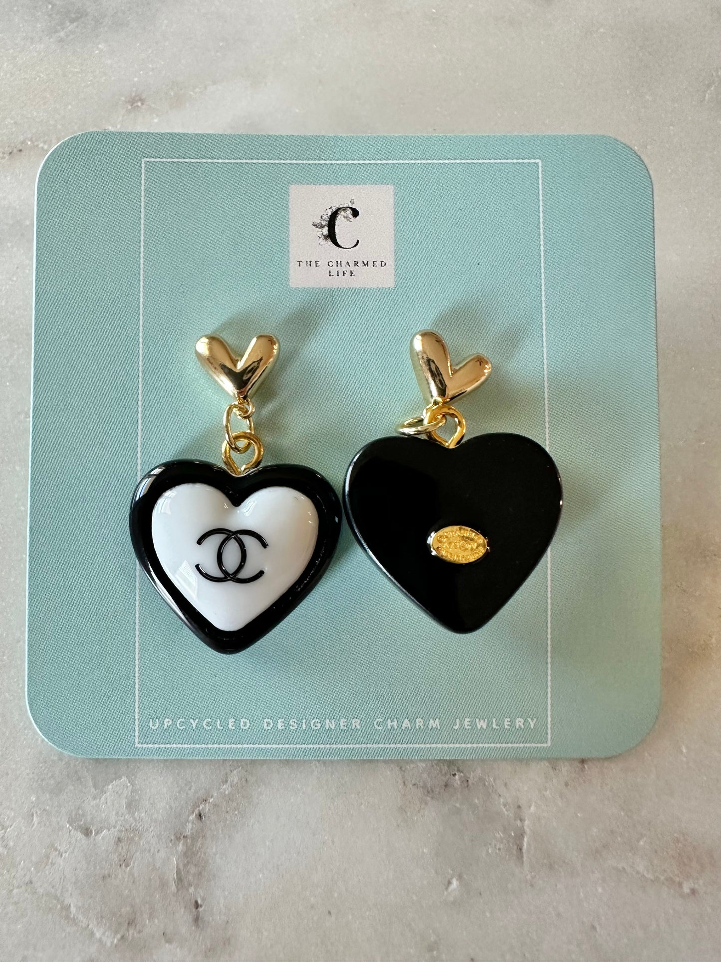 CC black and white resin heart earrings