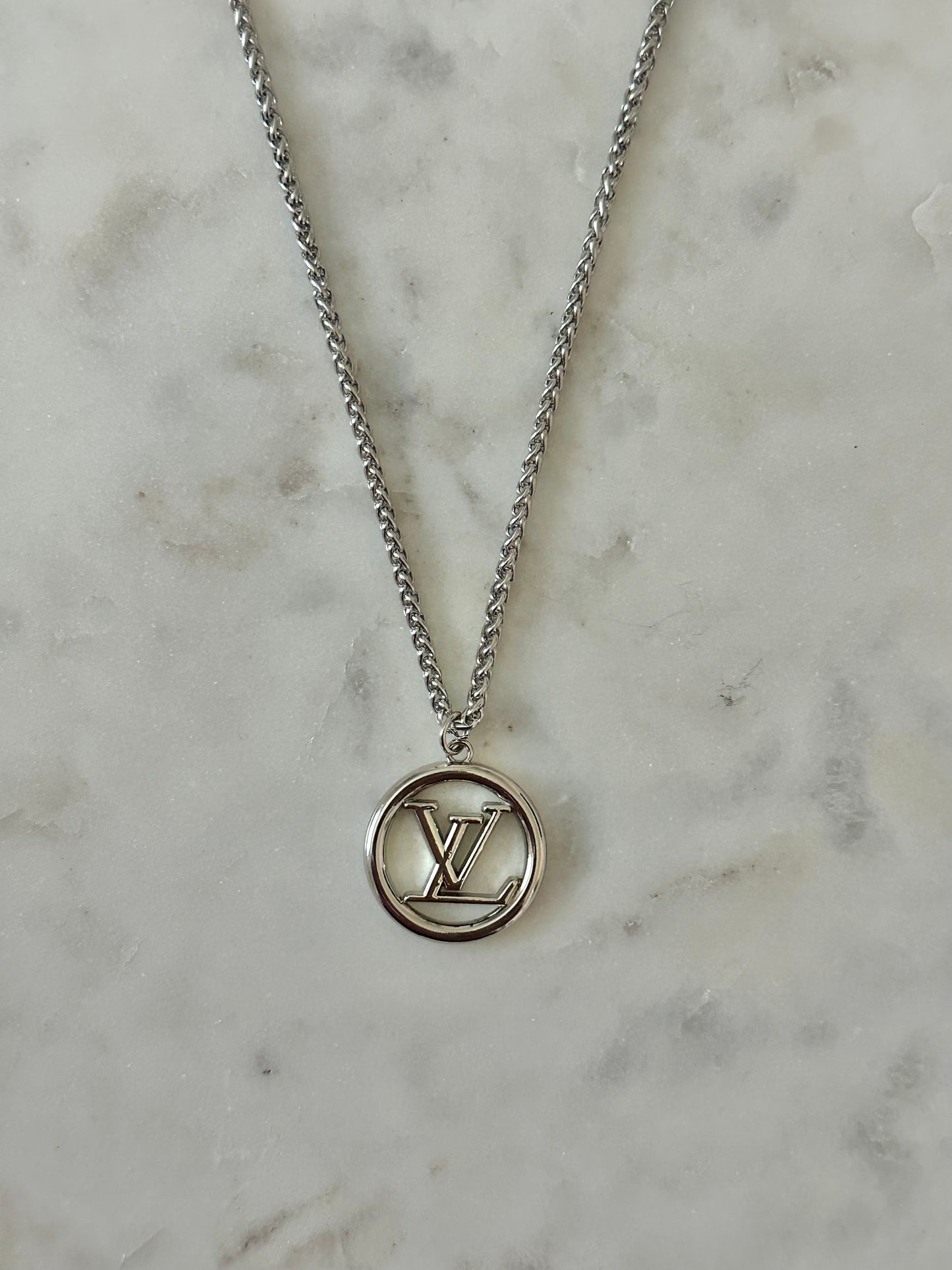 LV medallion necklace