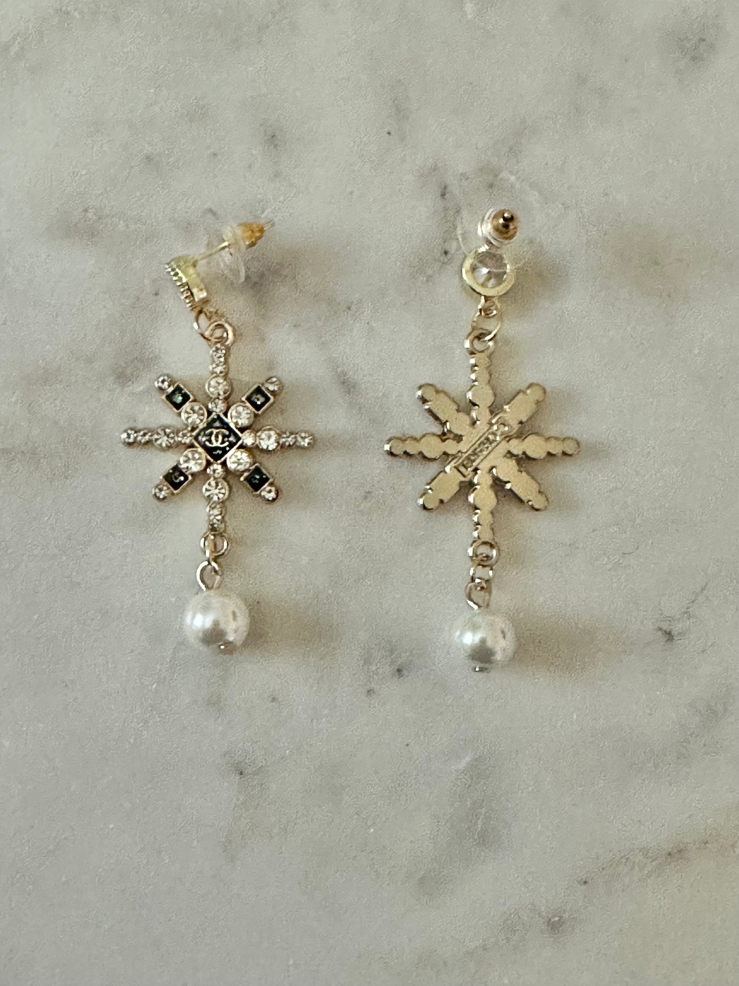 CC starburst earrings