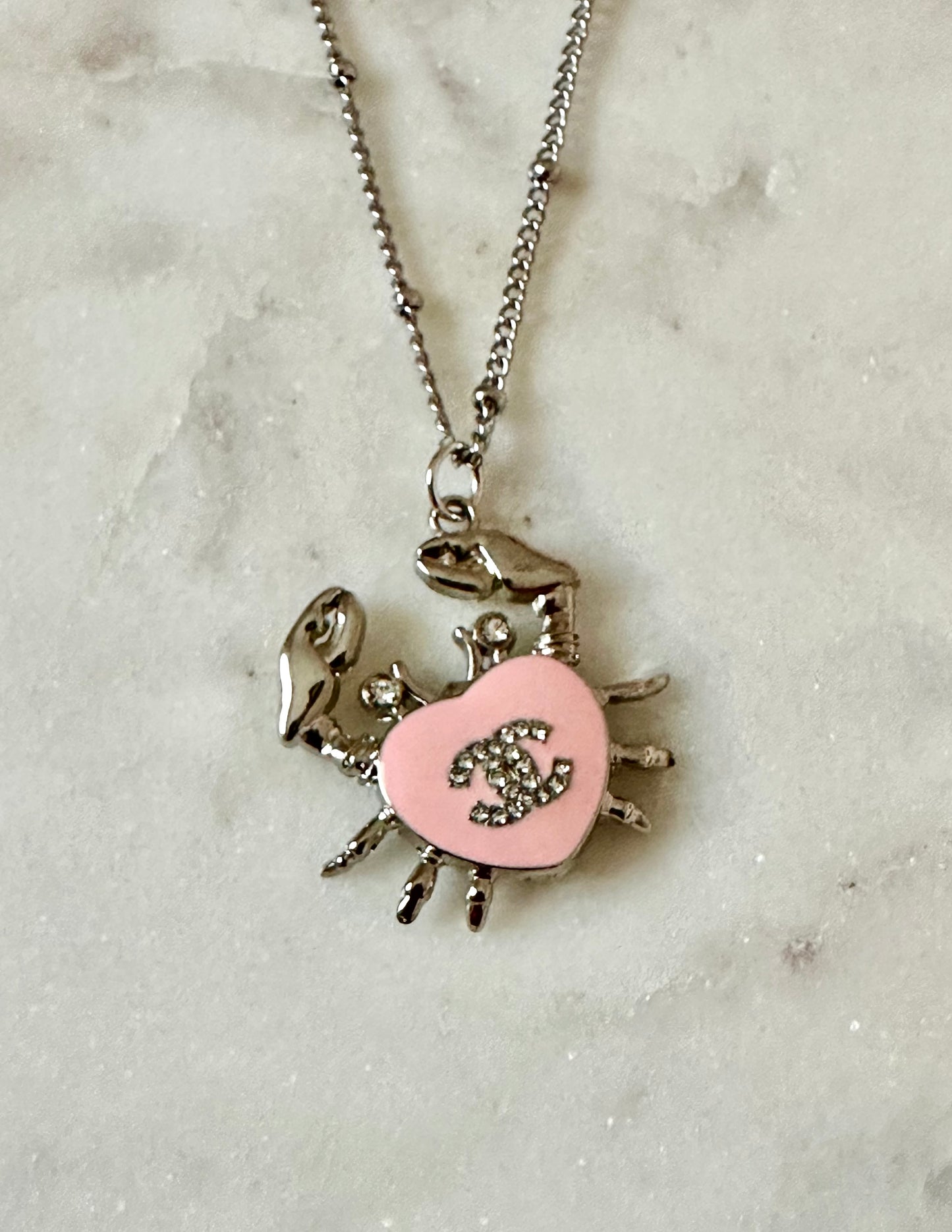 CC pink crab necklace