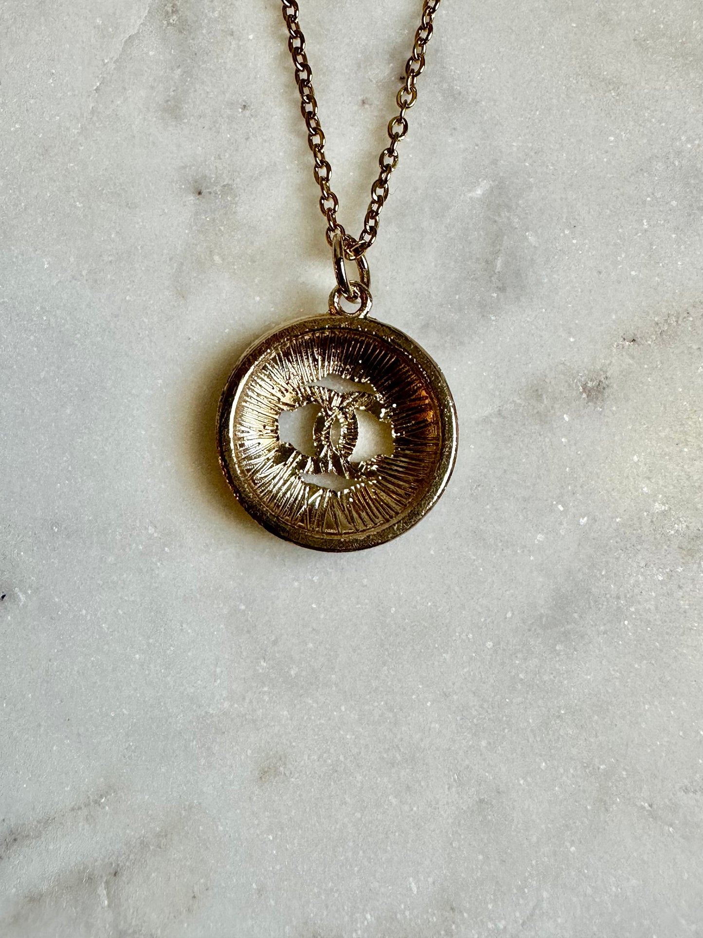 CC round goldtone necklace