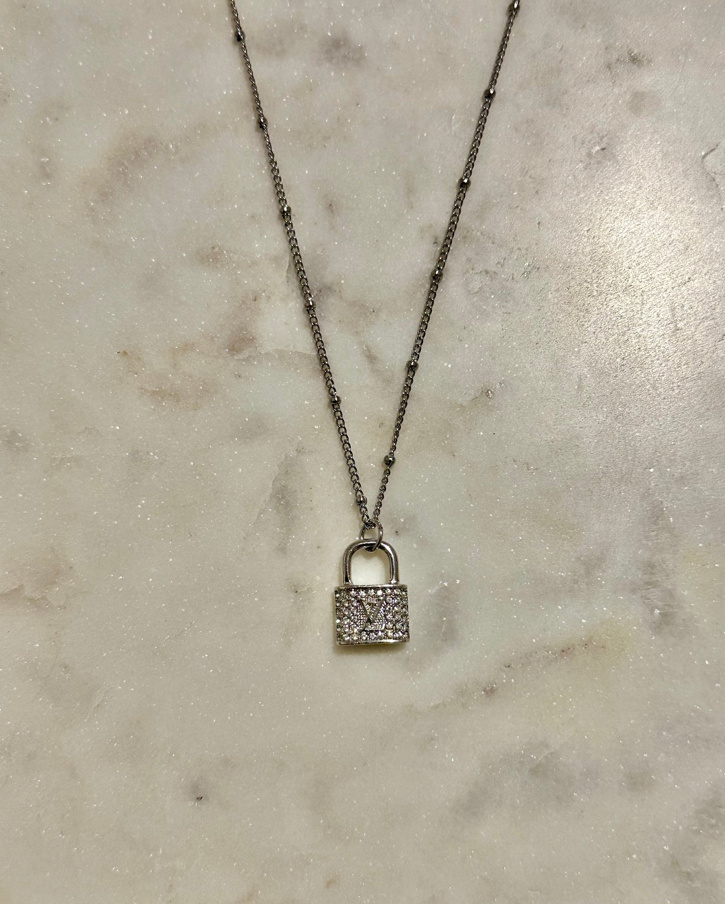 LV rhinestone lock necklace