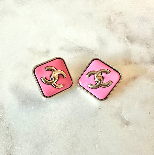 CC pink turn lock button earrings