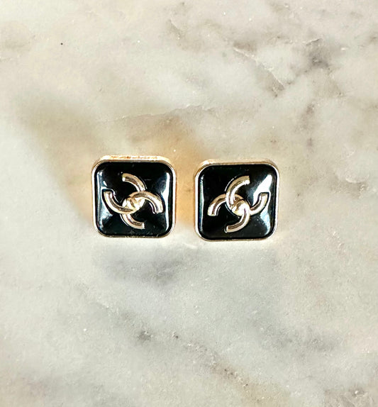 CC black turn lock button earrings