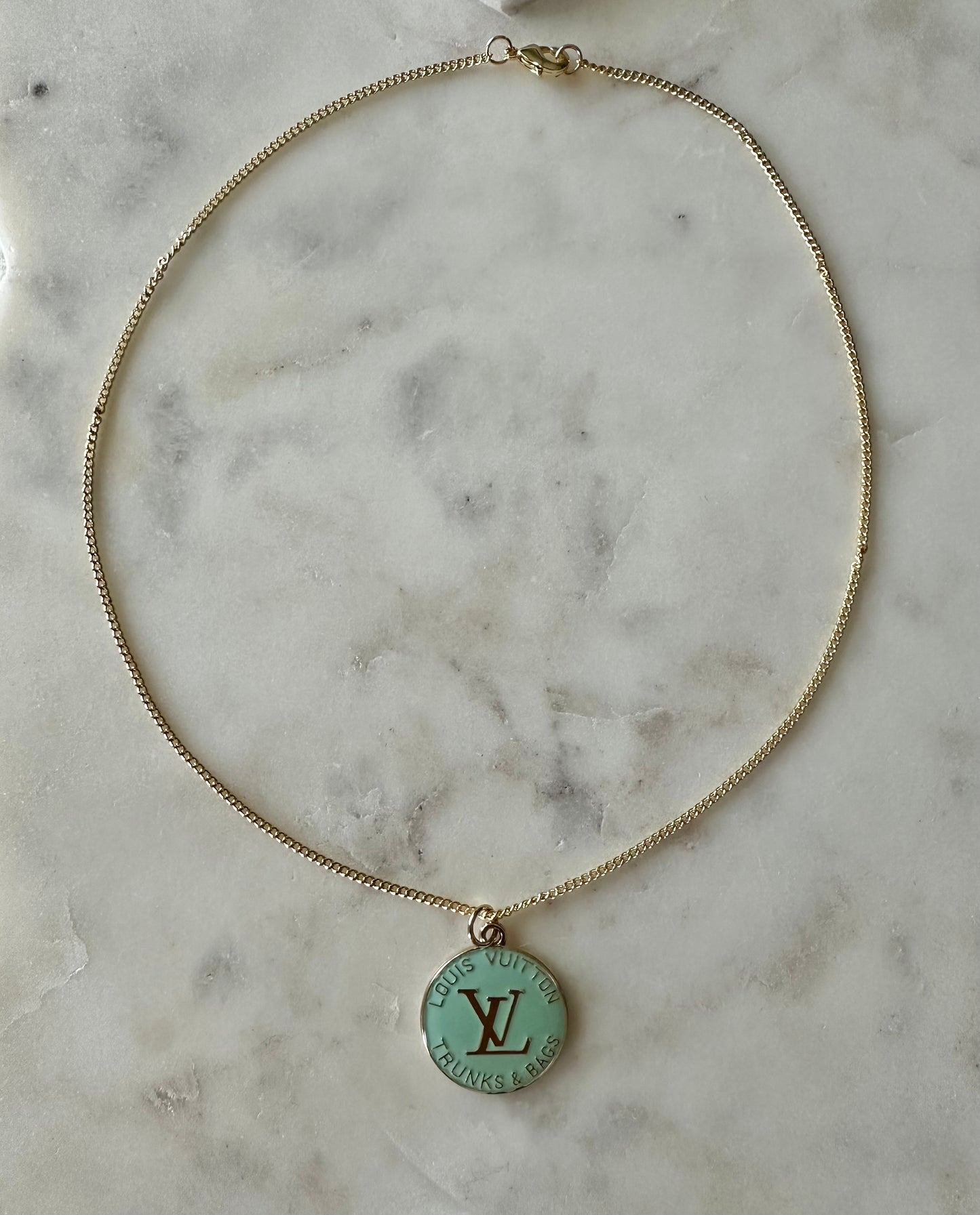 LV mint blue charm necklace 16”