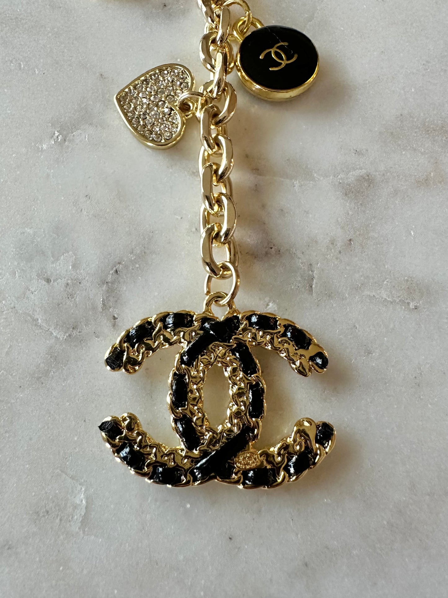 CC black faux leather keychain