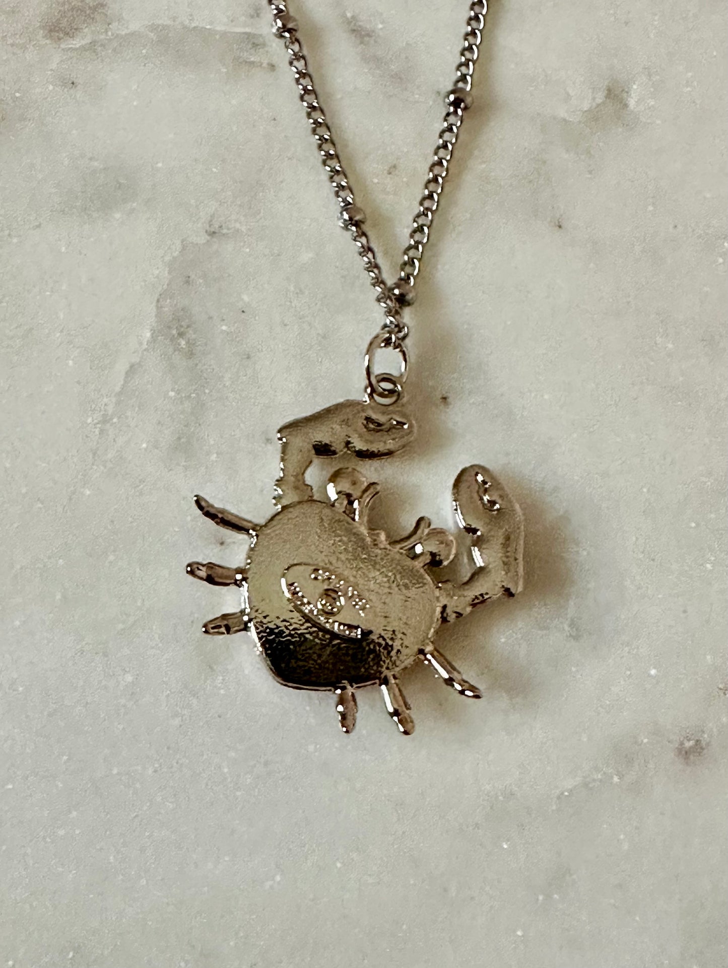 CC pink crab necklace