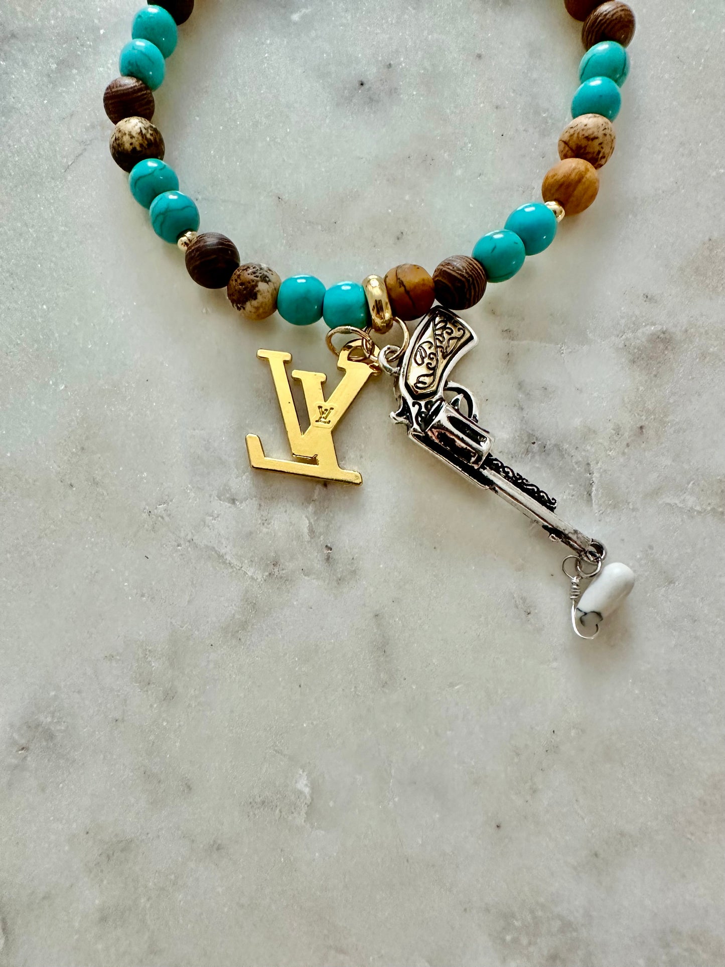 LV guns and LV bracelet