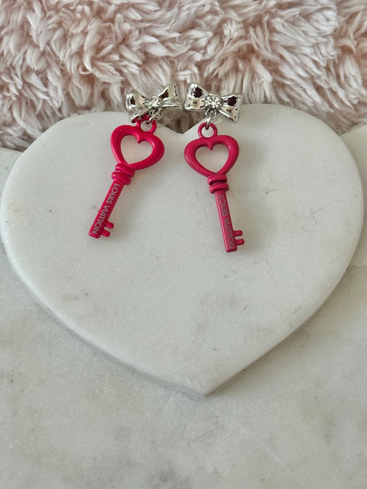 LV hot pink lock earrings