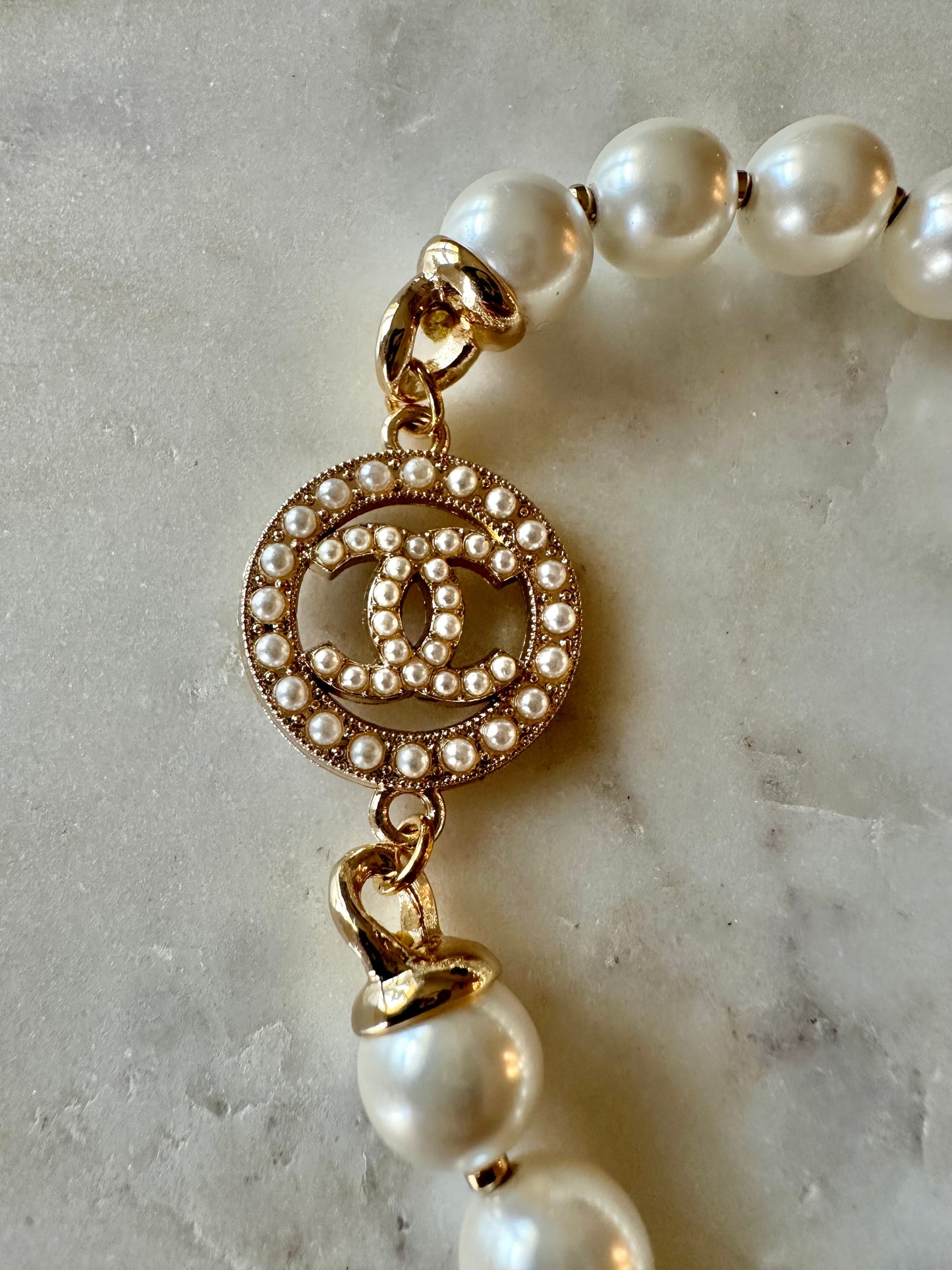 CC faux pearl stretch bracelet
