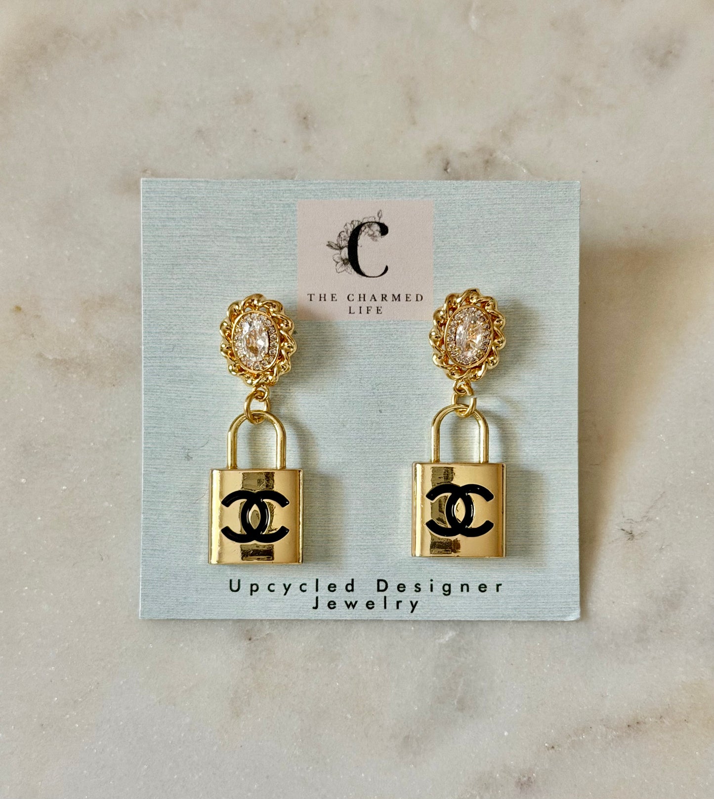 CC lock and rhinestone earrings