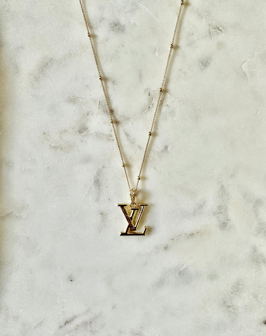LV gold tone necklace