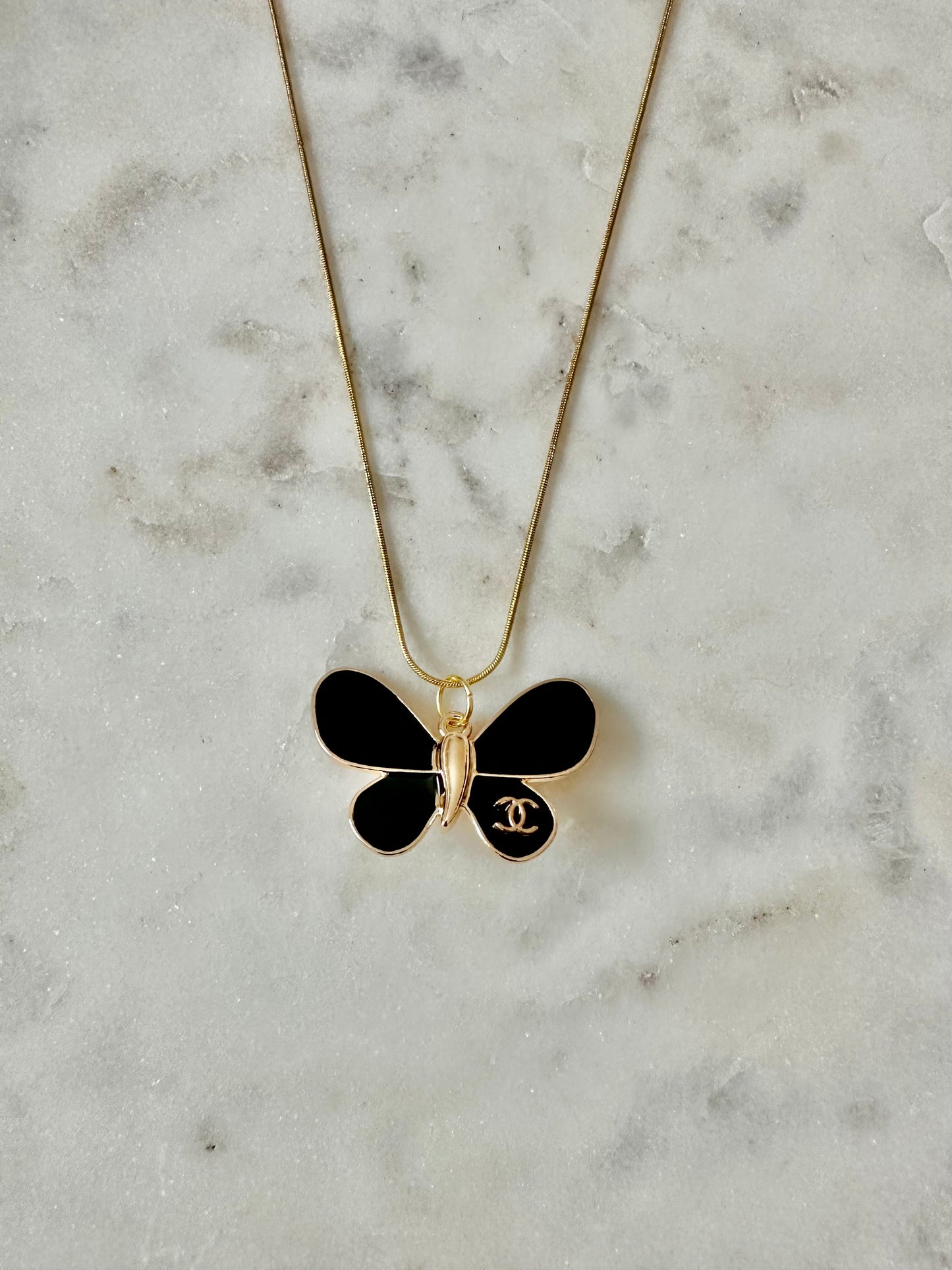 CC black butterfly necklace