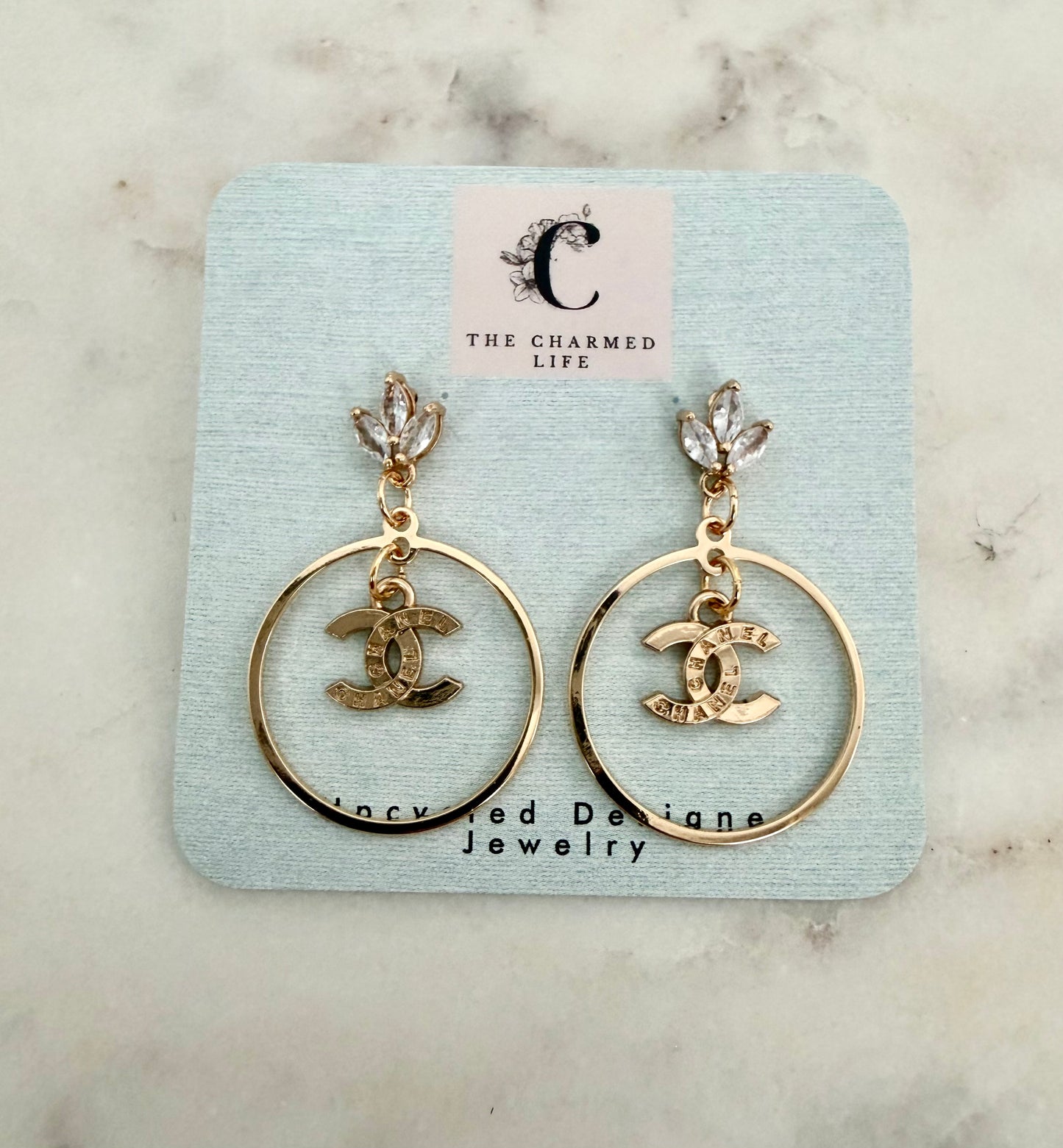 CC with rhinestone halo earrings