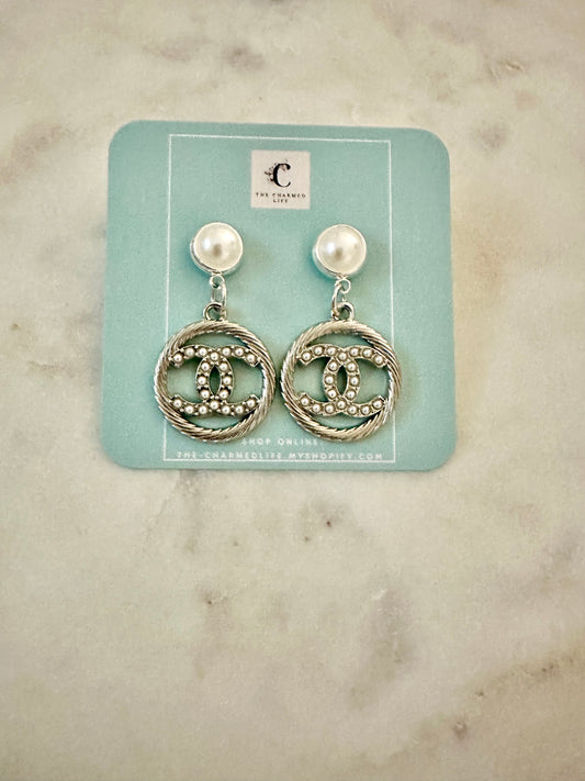 CC faux pearl/silvertone earrings