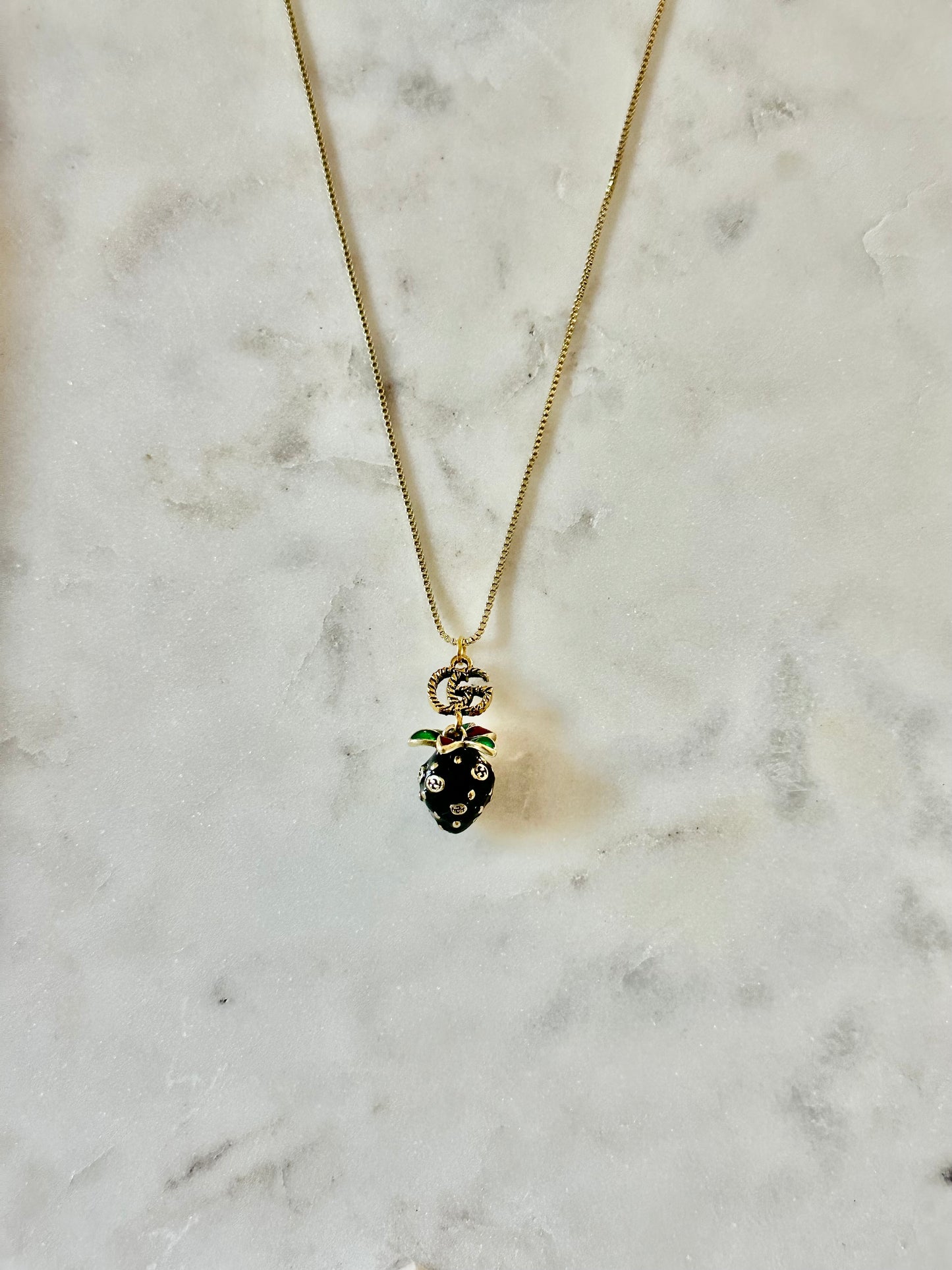Gucci black strawberry necklace