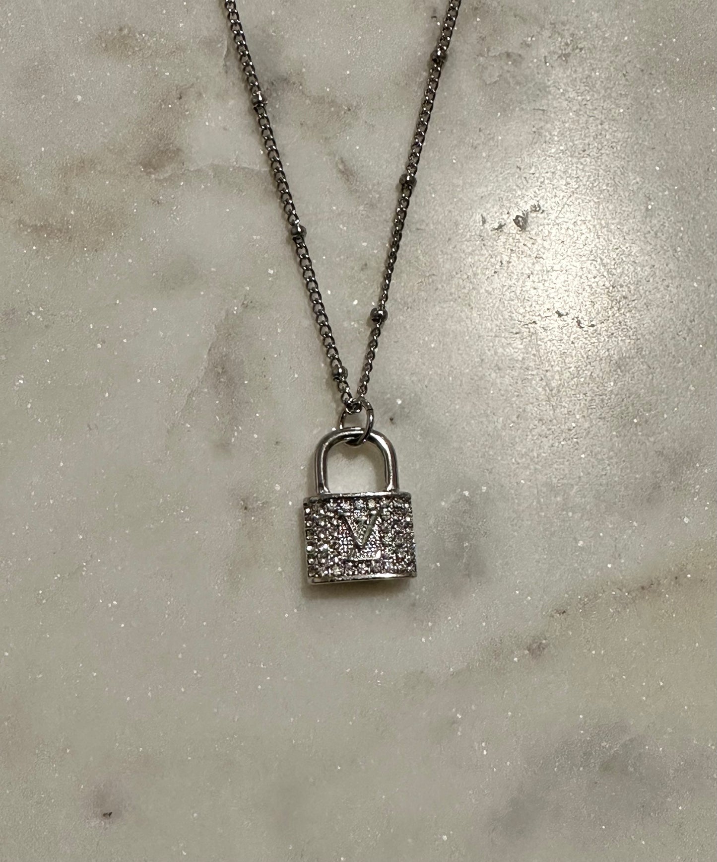 LV rhinestone lock necklace