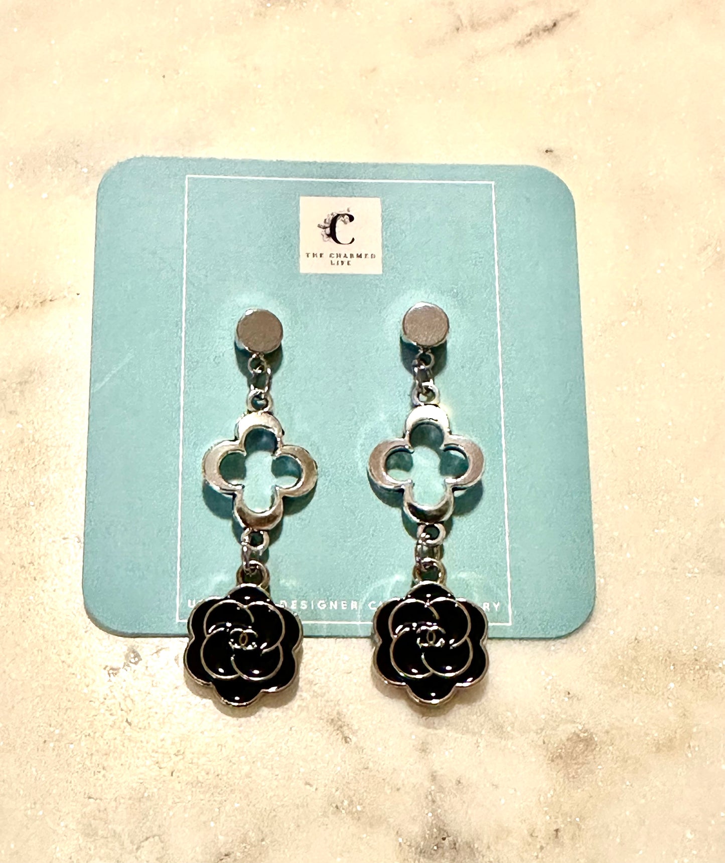CC black camellia flower earrings