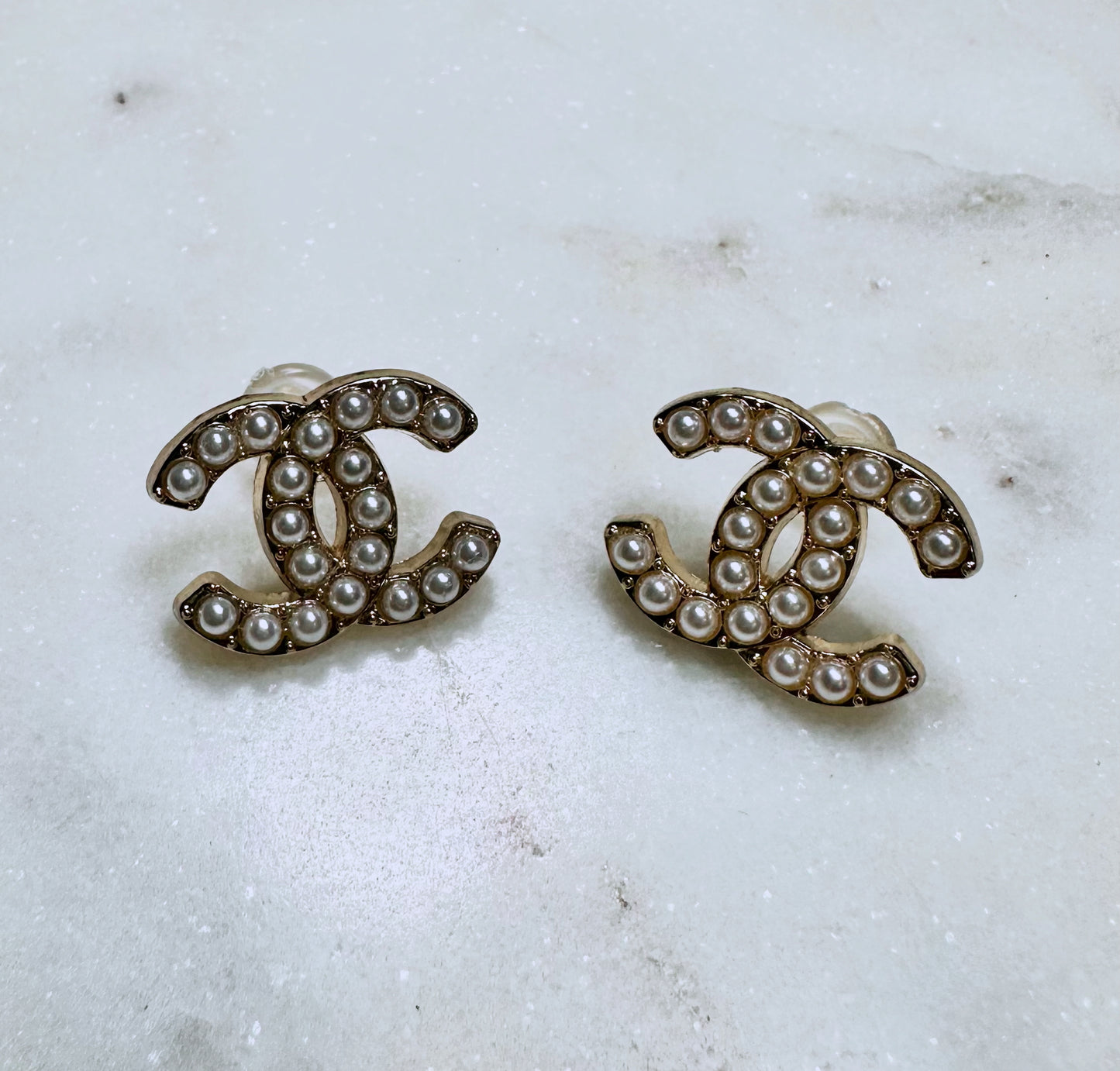 CC faux pearl button earrings