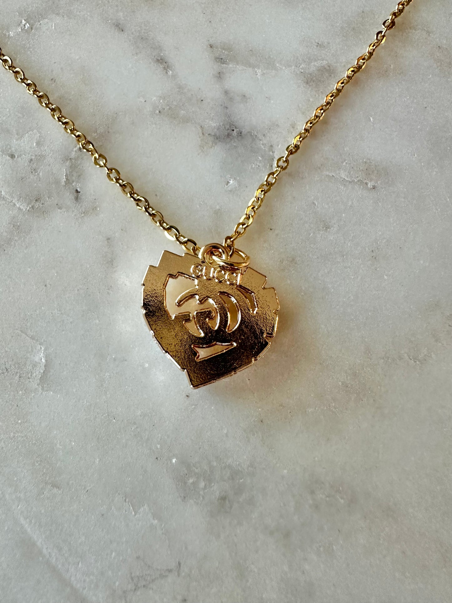 Gucci pearl heart necklace 16”