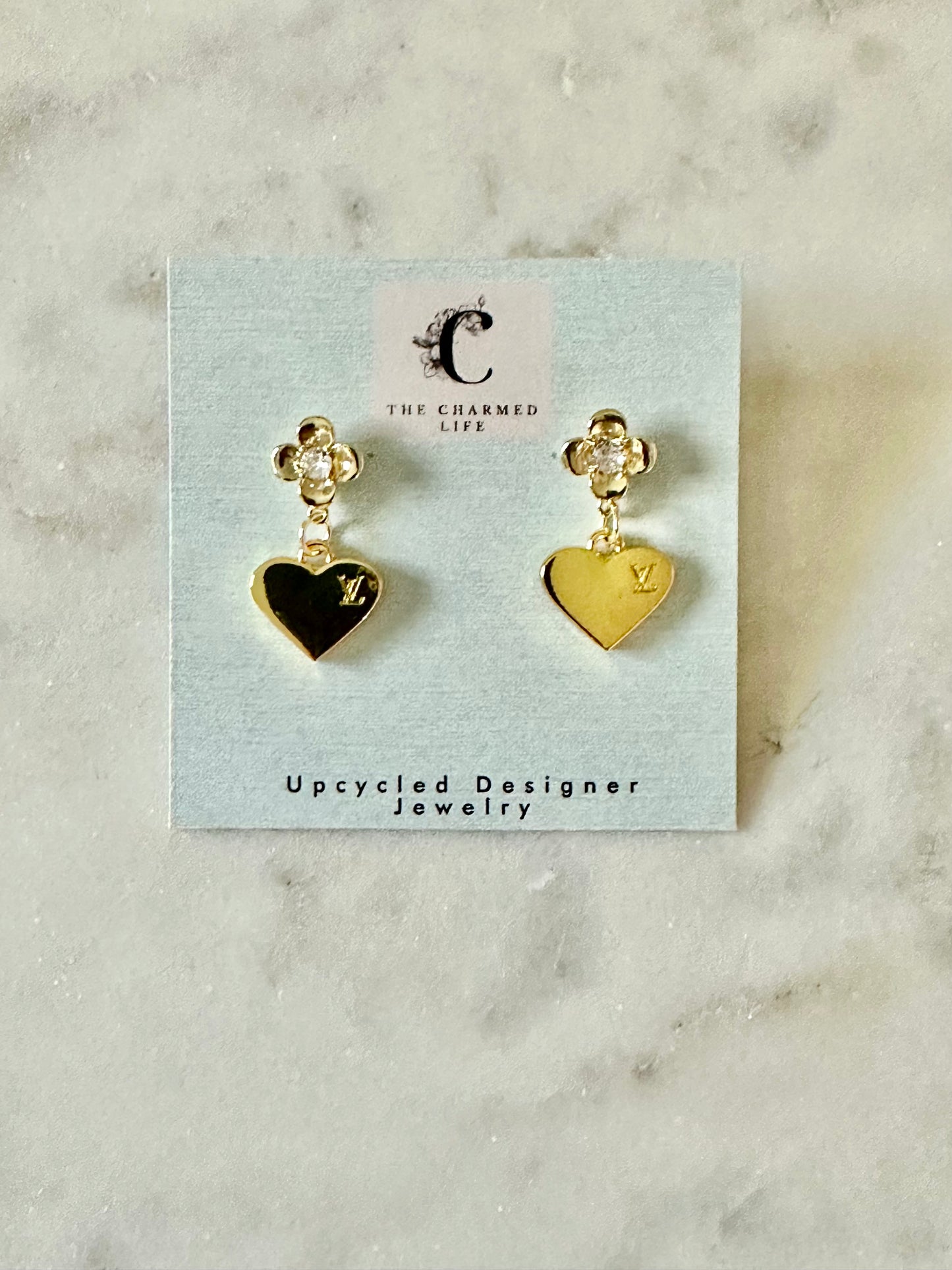 LV heart gold tone earrings