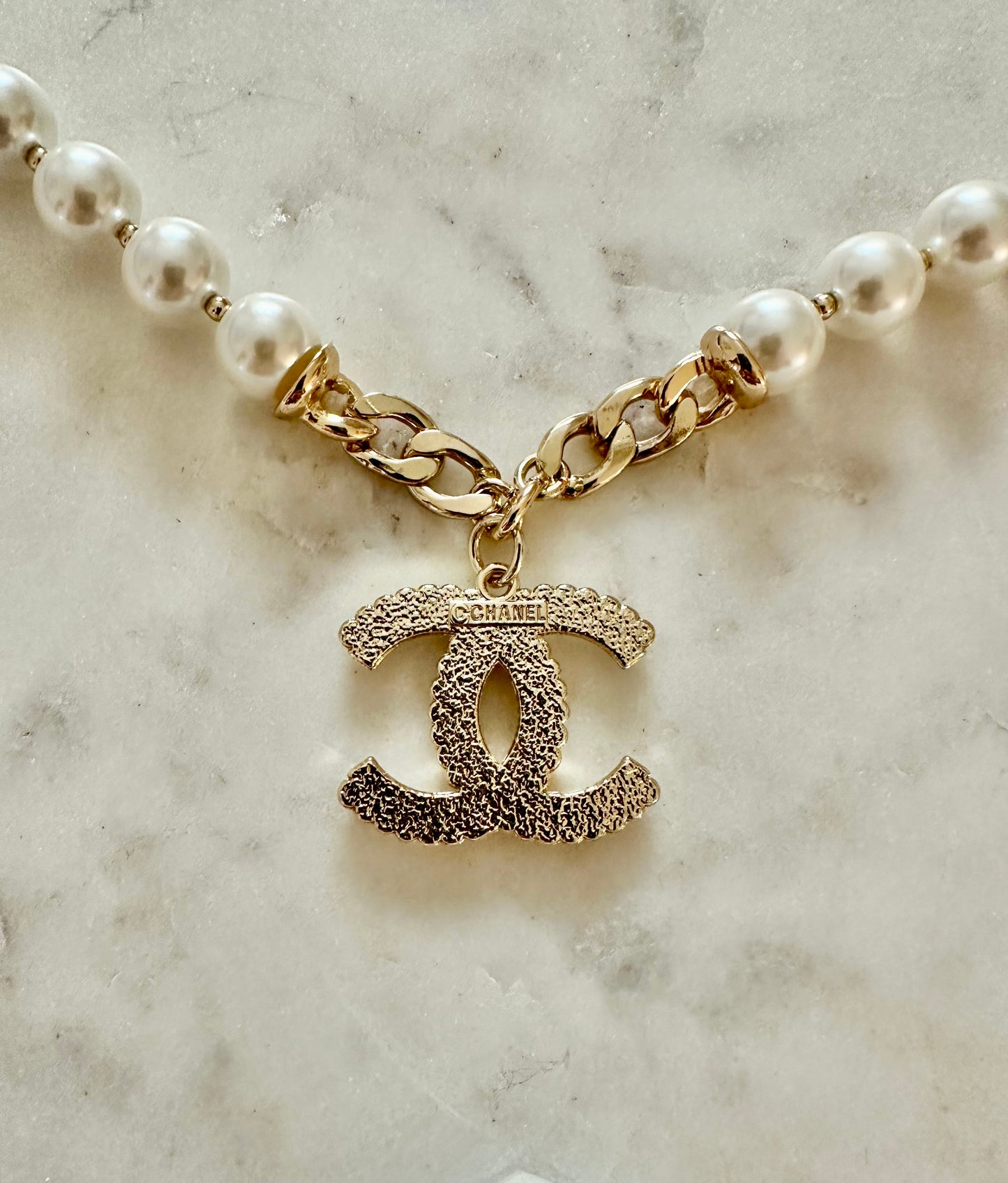 CC white pearl necklace