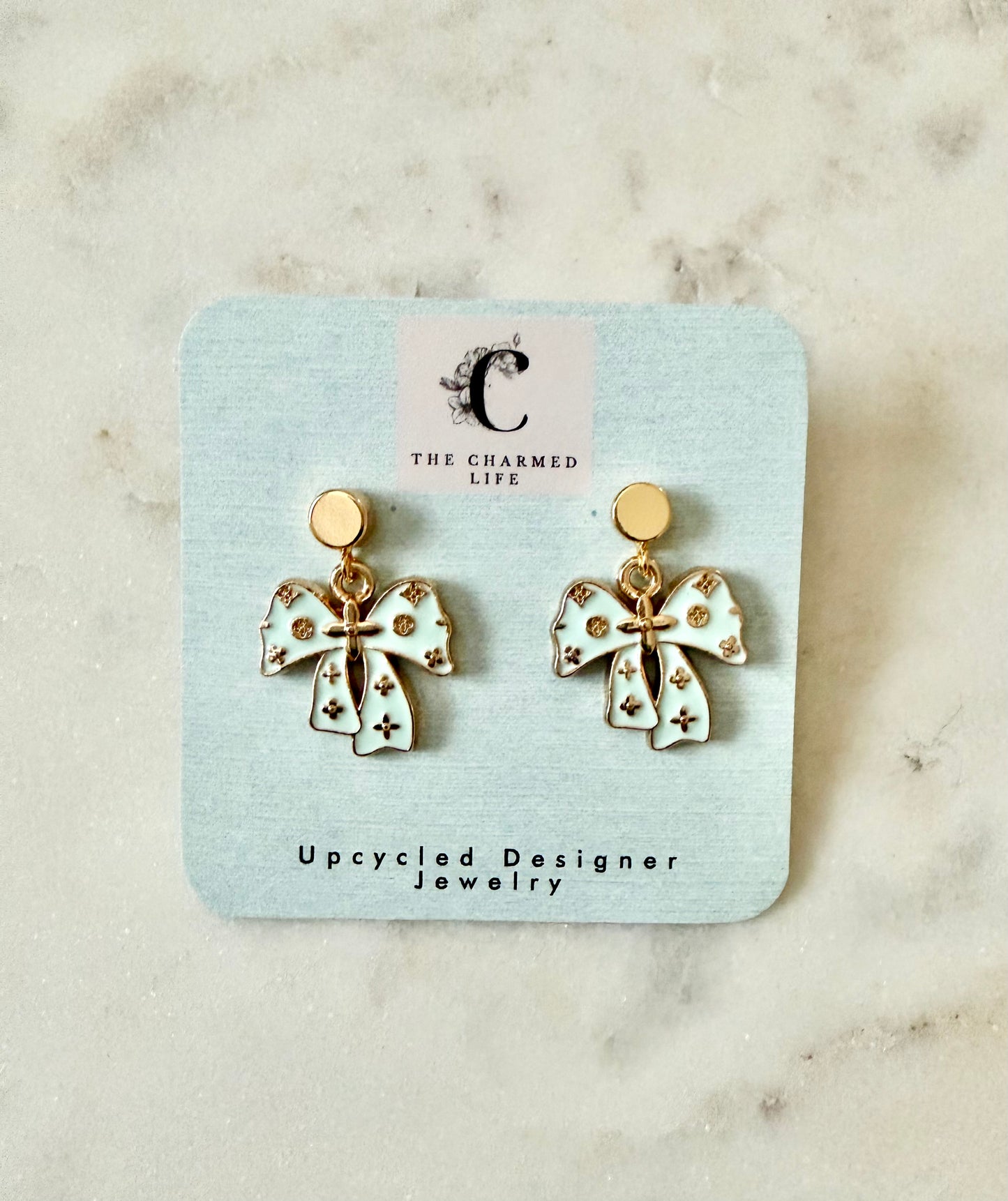 LV mint bow earrings
