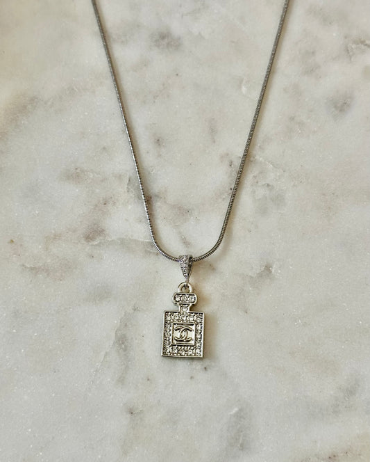 CC Perfume bottle silver tone necklace