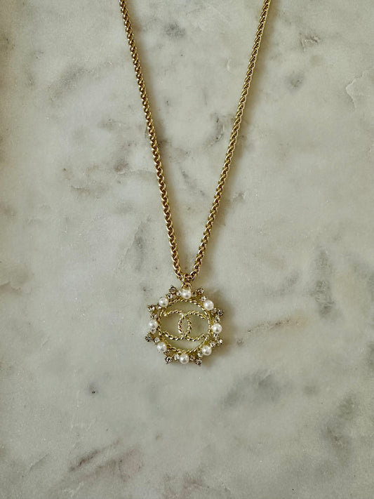 CC round pendant with rhinestone/faux pearl accent necklace