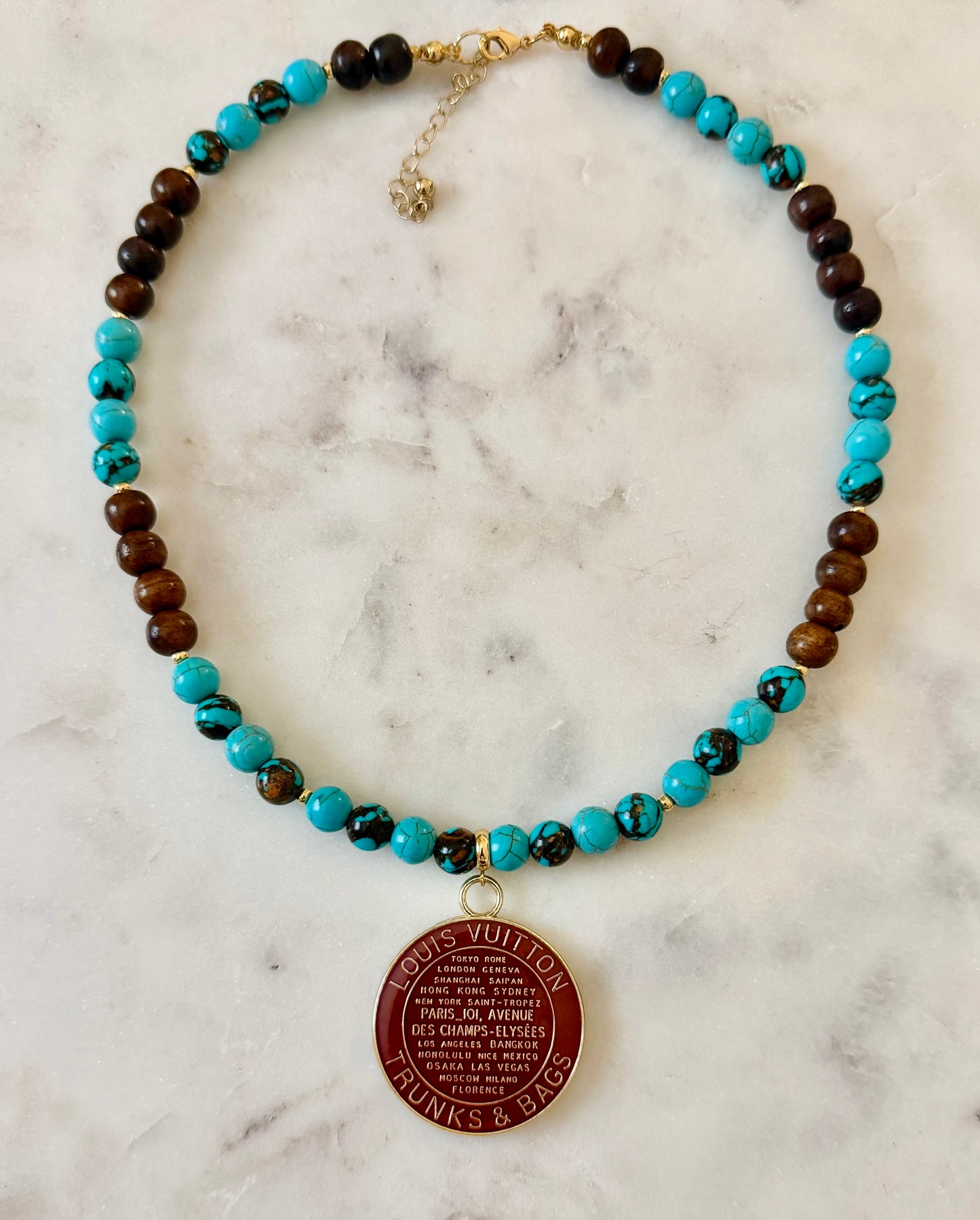 LV brown trunks and bag beaded necklace