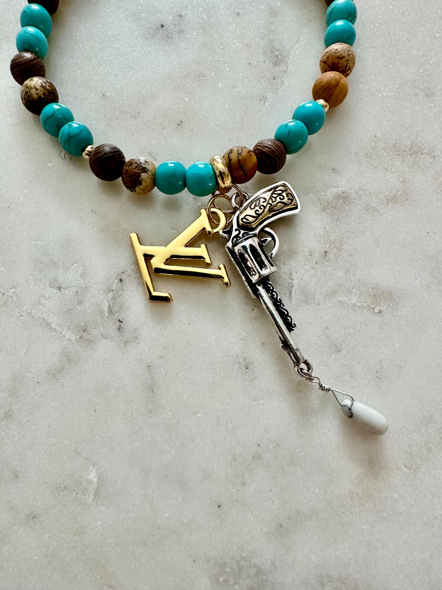 LV guns and LV bracelet