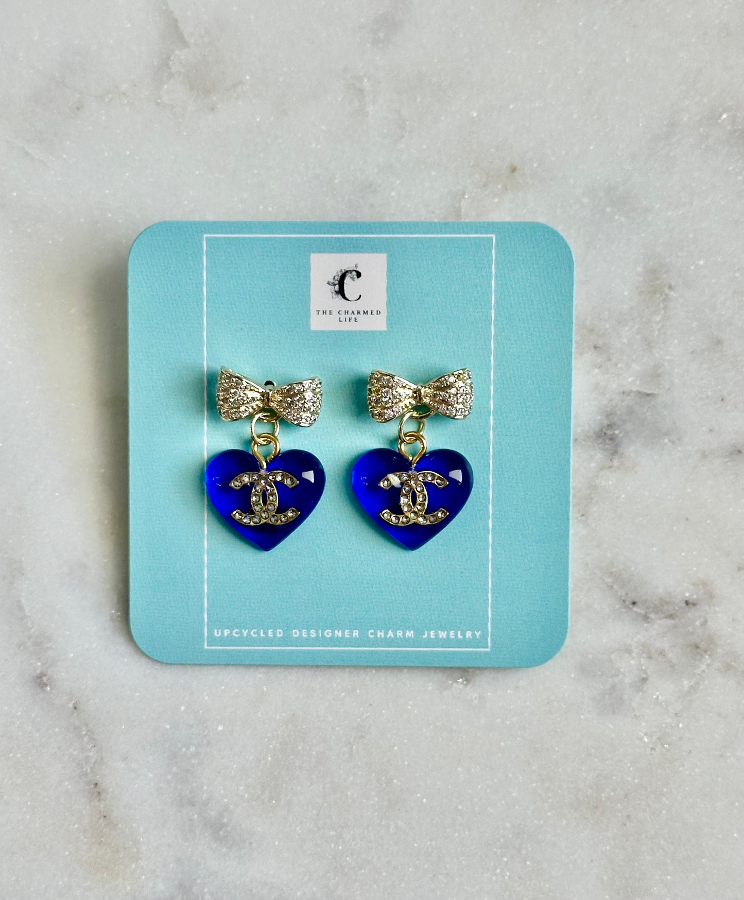 CC blue heart bow earrings