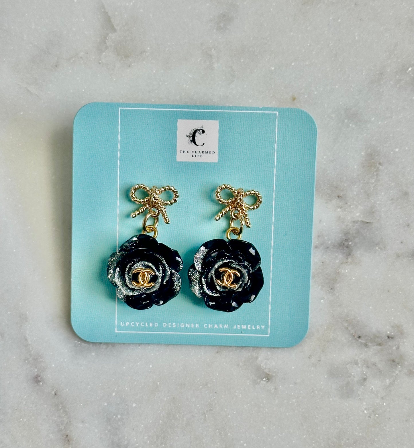 CC black rose bow earrings