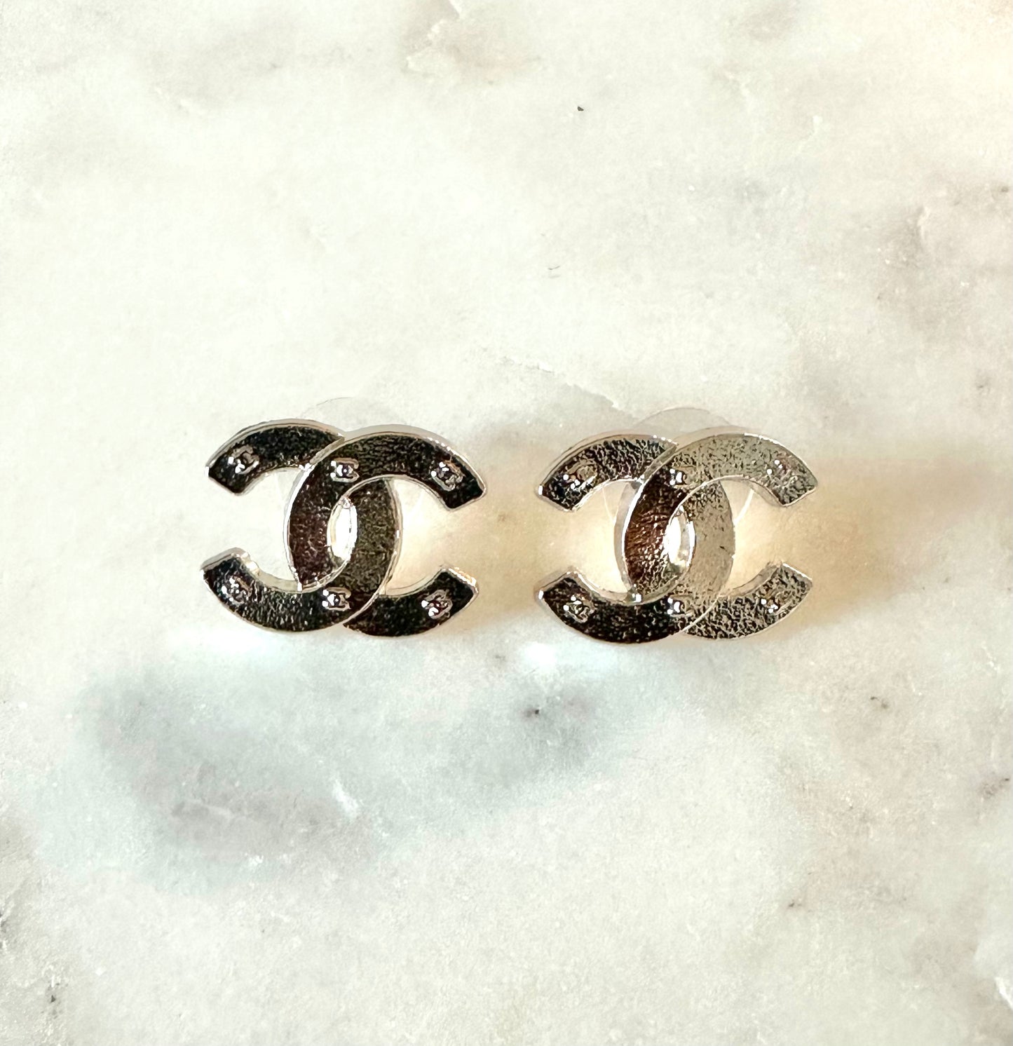 CC silver mini cc’s button earrings