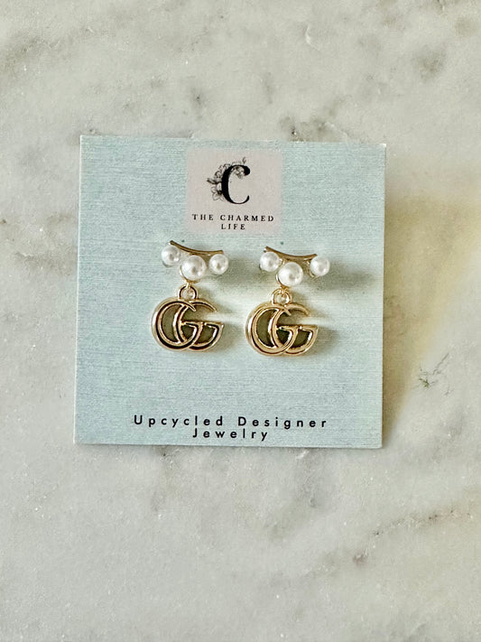 Gucci gold tone with faux pearl accent earrings