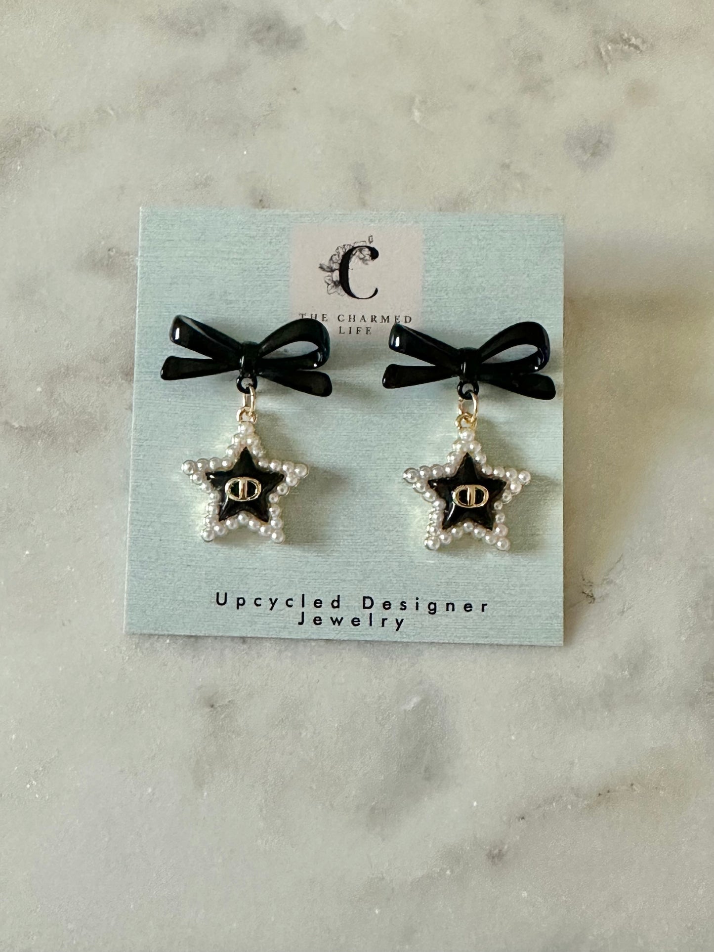 Dior star with faux pearl accent earrings