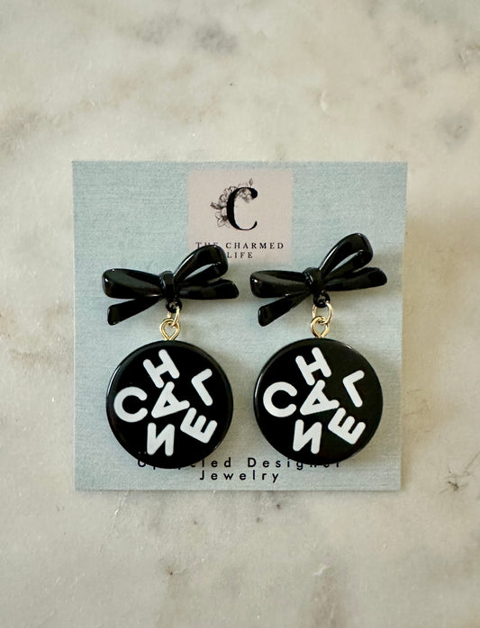Chanel resin black and white earrings