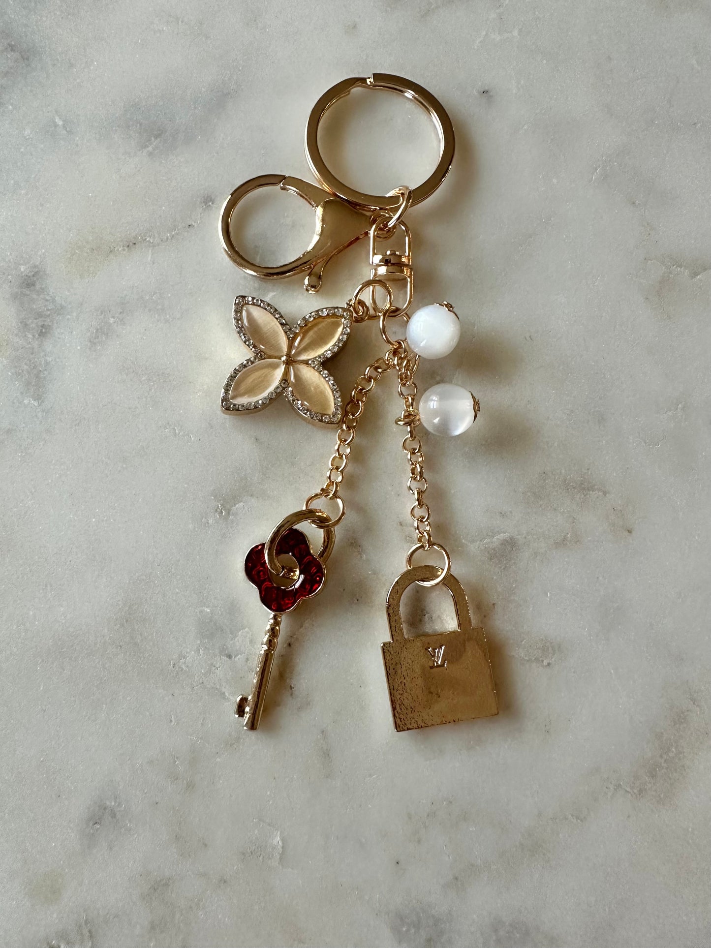 LV lock and key keychain