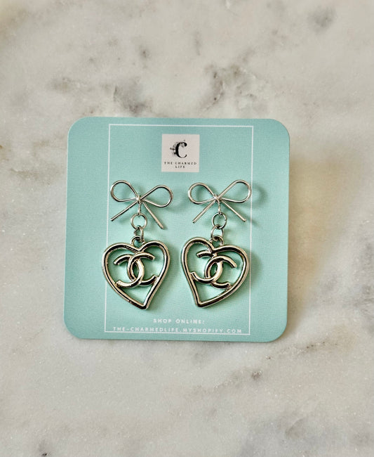 CC heart bow earrings