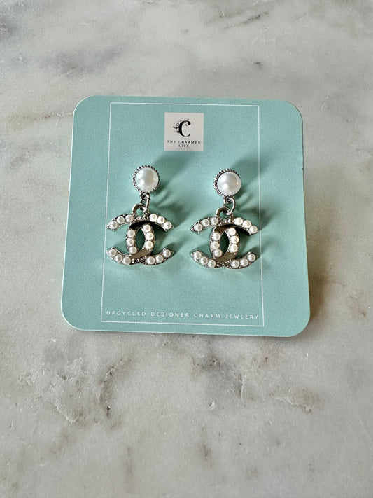 CC pearl and silver tone pendant earrings