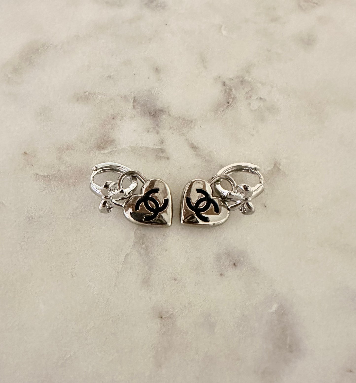 CC silver heart bow earrings