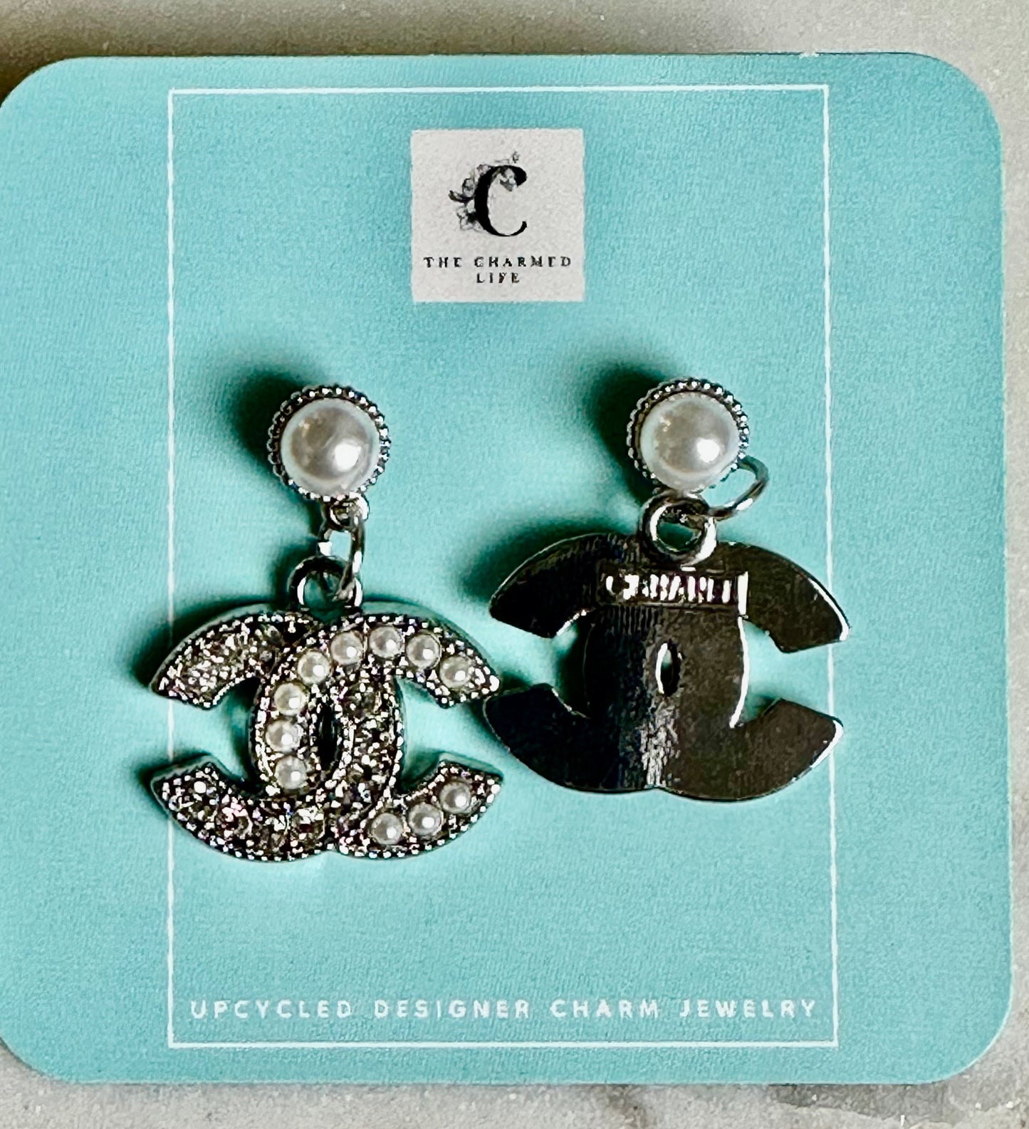 CC pearl and rhinestone silver tone earrings