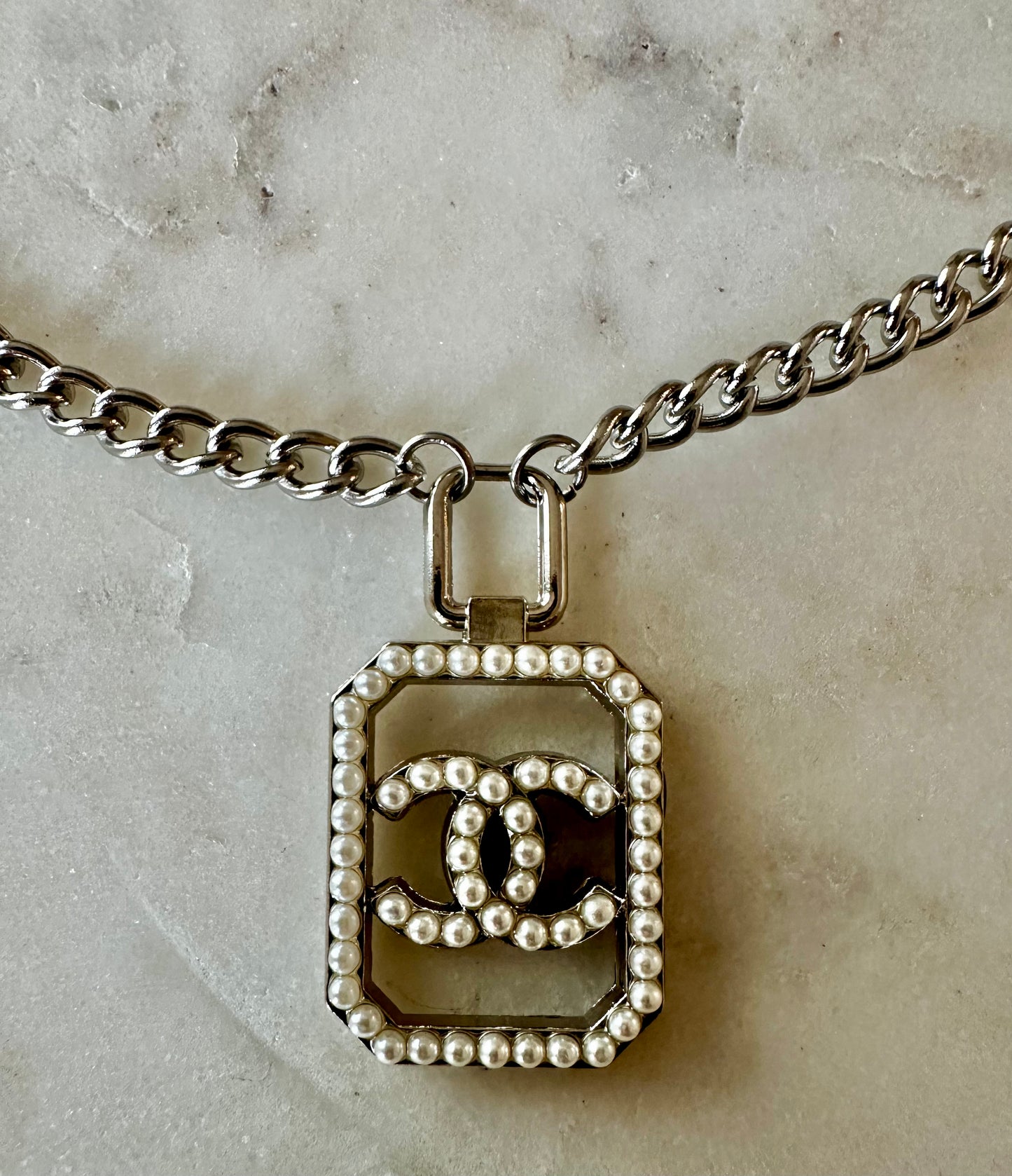 CC pearl and silver tone necklace