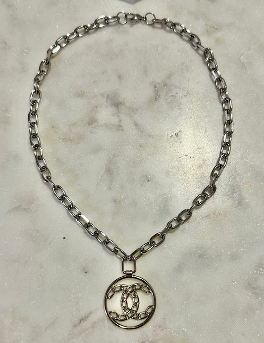 CC braided silver tone necklace