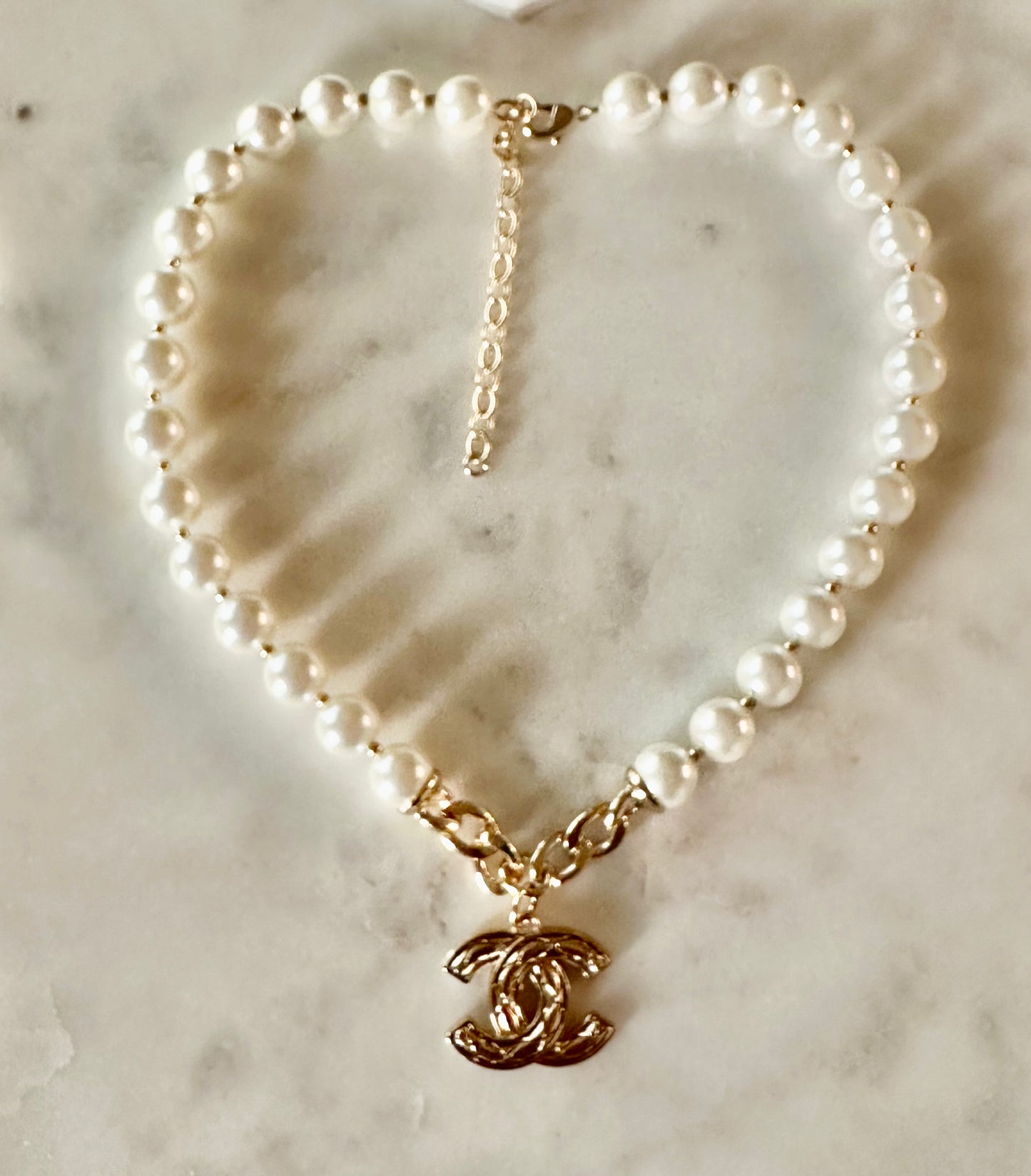 CC quilted and faux pearl necklace