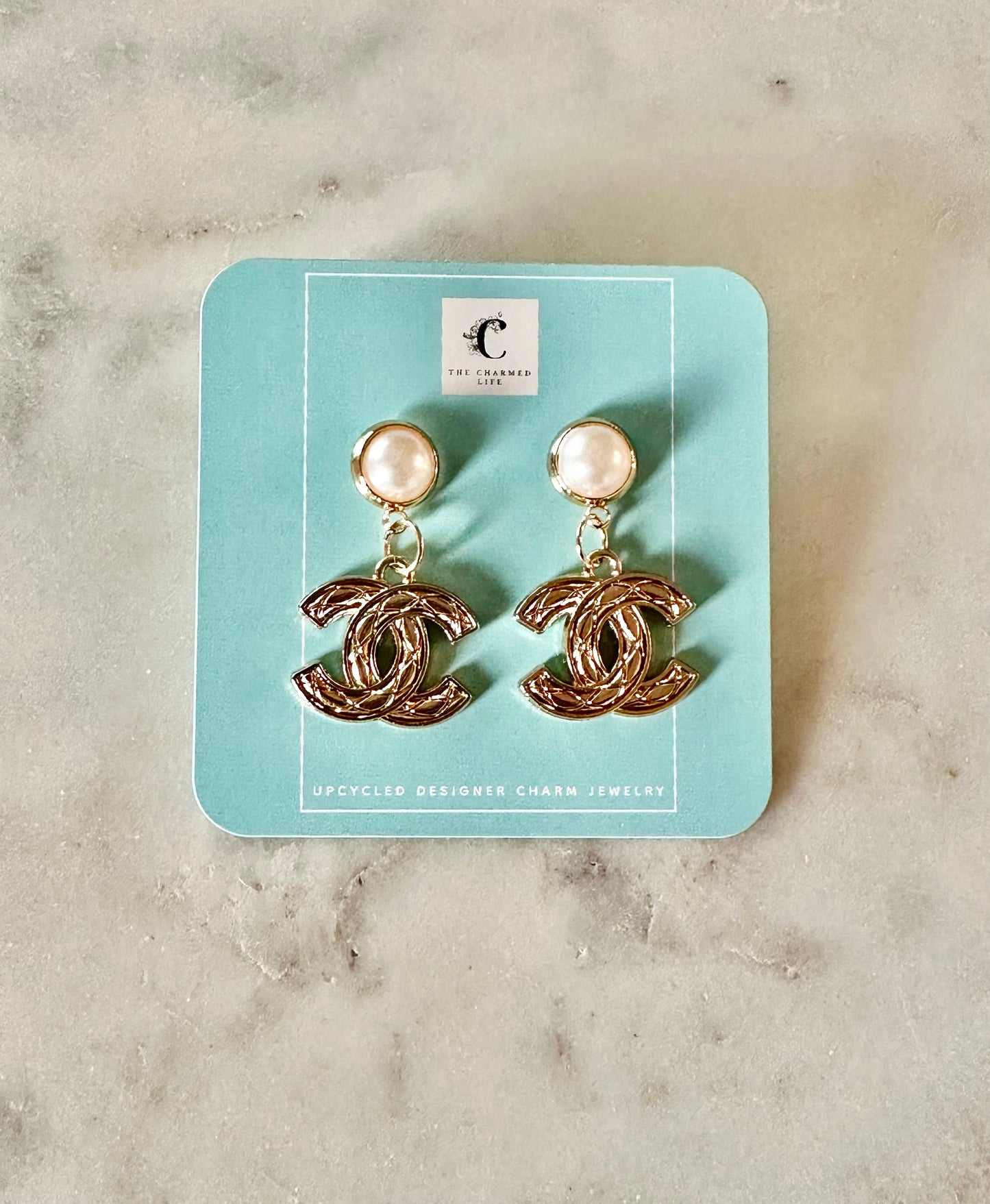CC quilted faux pearl earrings