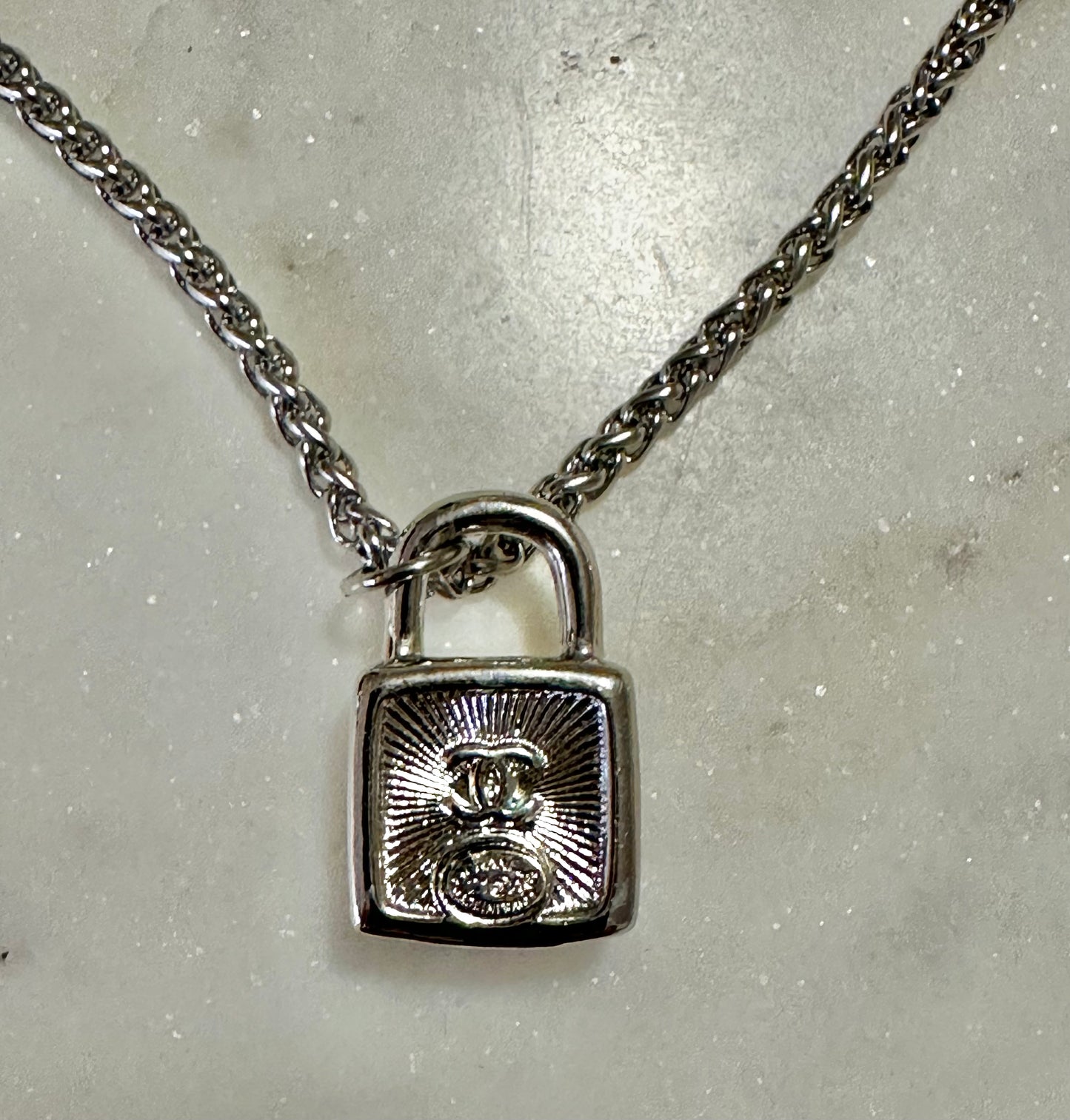 CC rhinestone silver lock necklace